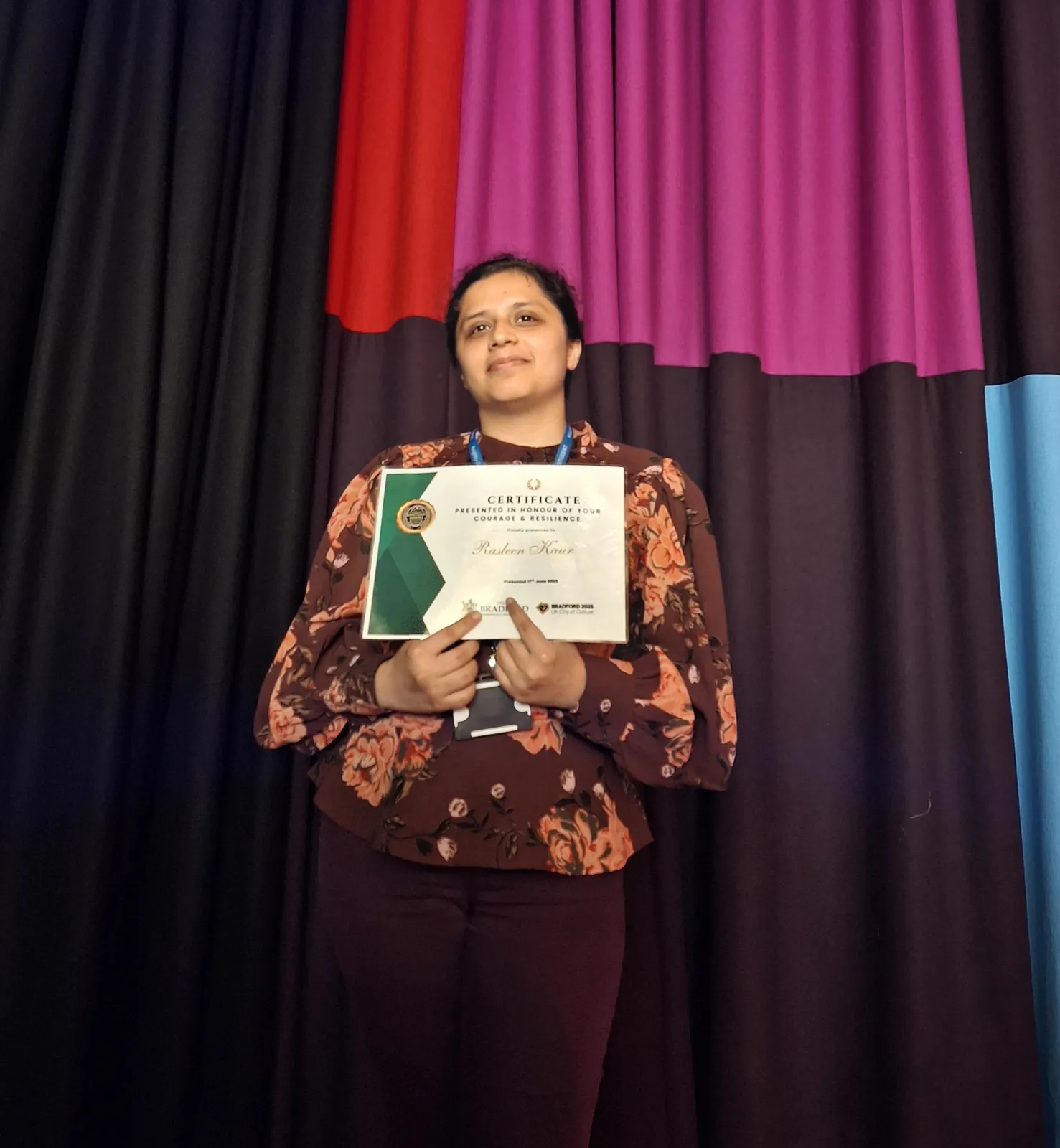 KC student accepting an award for college of sanctuary